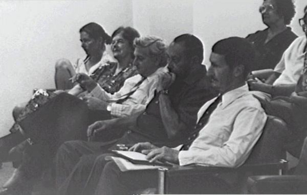 Yvonne Forrest and Michael Loos attending a function with a group of people at the State Reference Library
