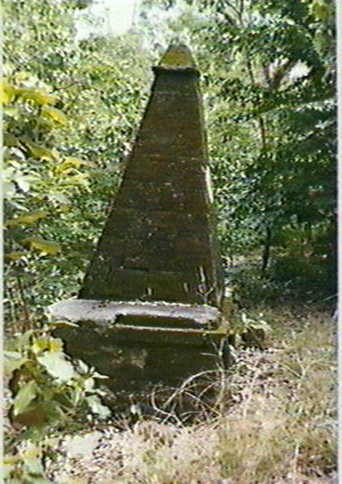 Headstone located in bush scrub