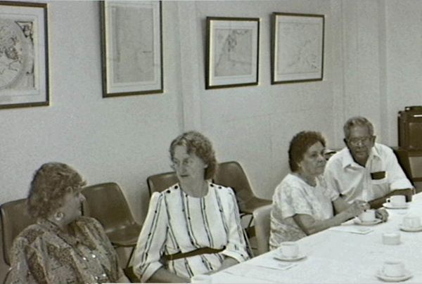 Beverley Davis and a group of people attending a function at the State Reference Library